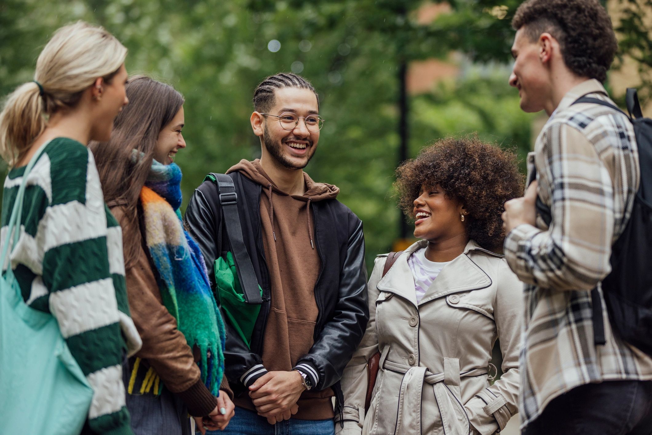 Group of students talking together outdoors